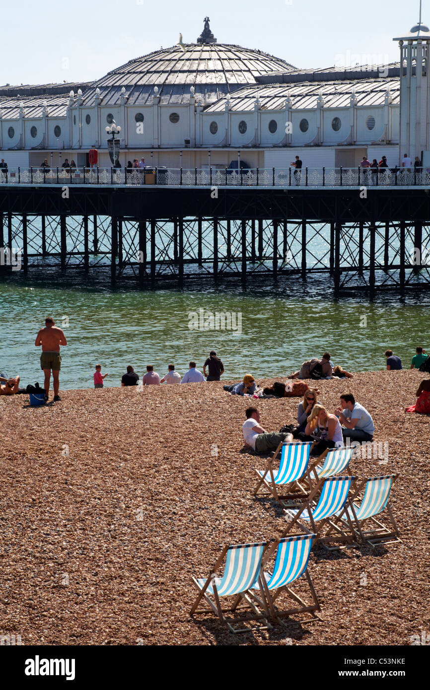 Brighton beach pier deck chair hi-res stock photography and images - Alamy