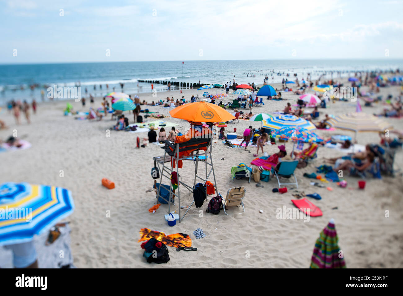 Beachgoers  at Rockaway Beach in the Queens borough of New York Stock Photo