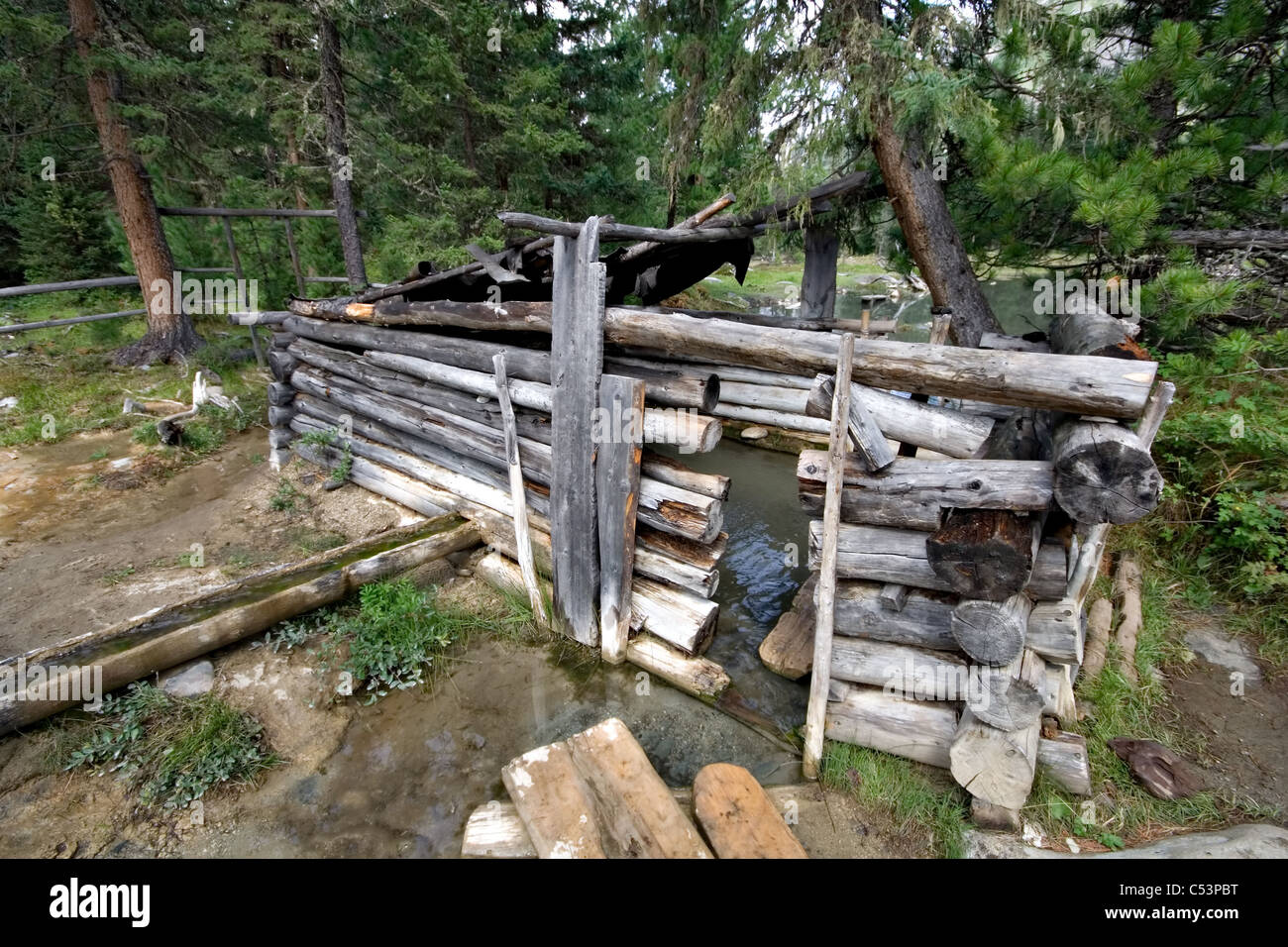 Mineral bath in Nature park Shumak. Shumak mineral springs. East Sayan Mountains. Siberia