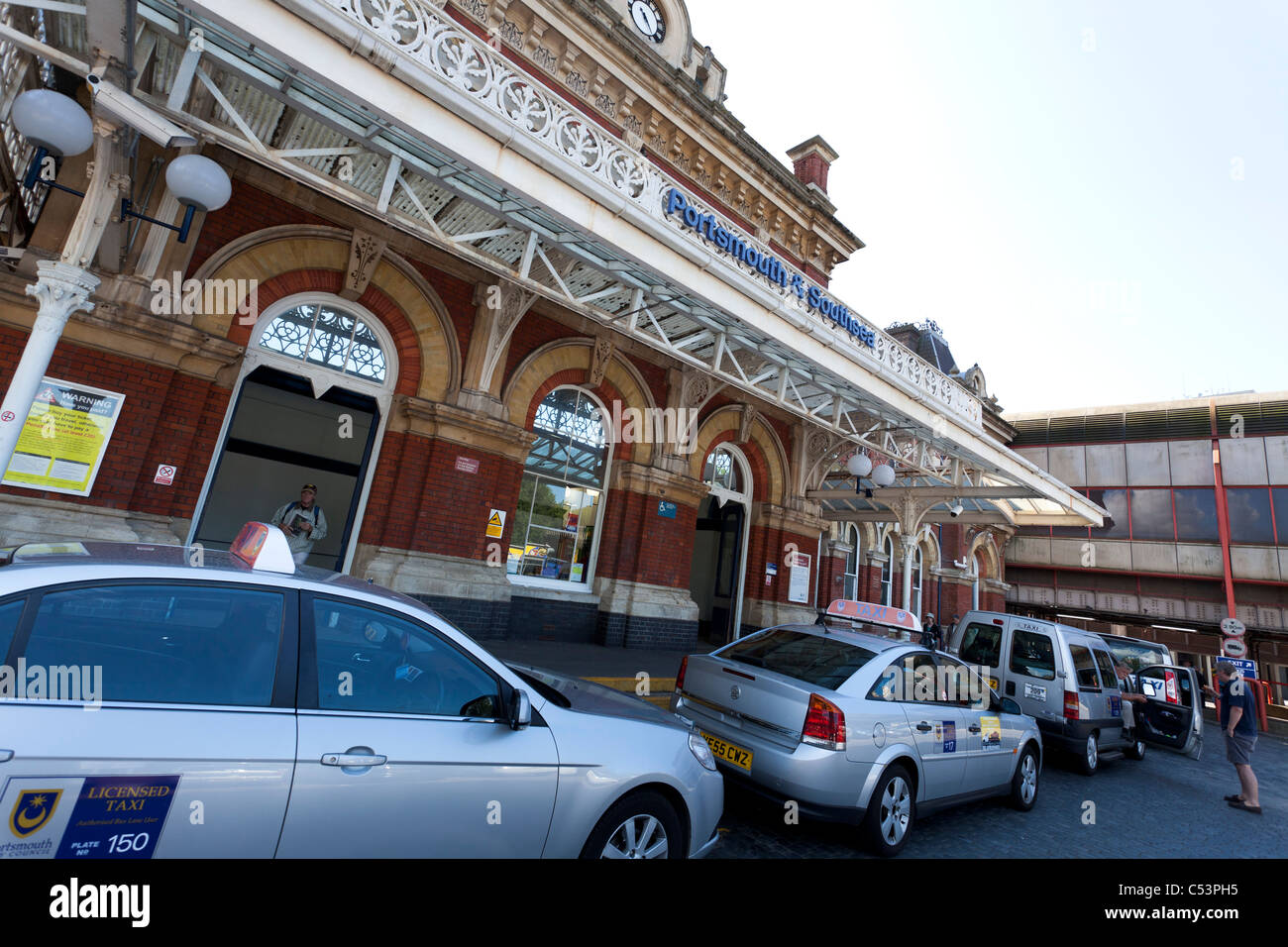 Portsmouth railway station with waiting taxis Stock Photo Alamy