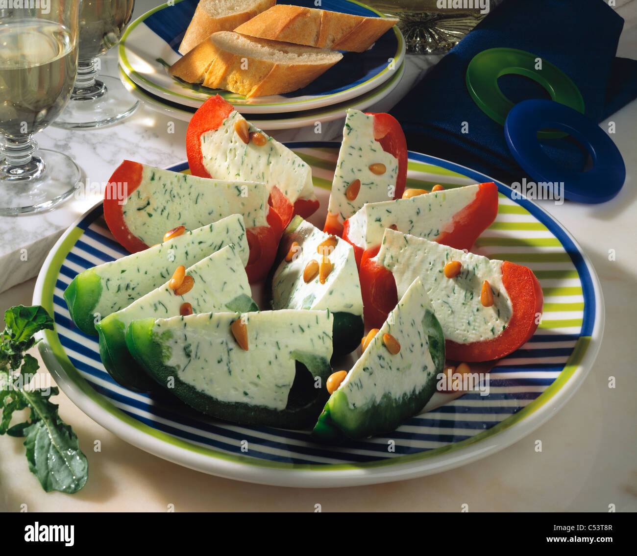 Sweet pepper boats with cream cheese rucola filling Stock Photo Alamy