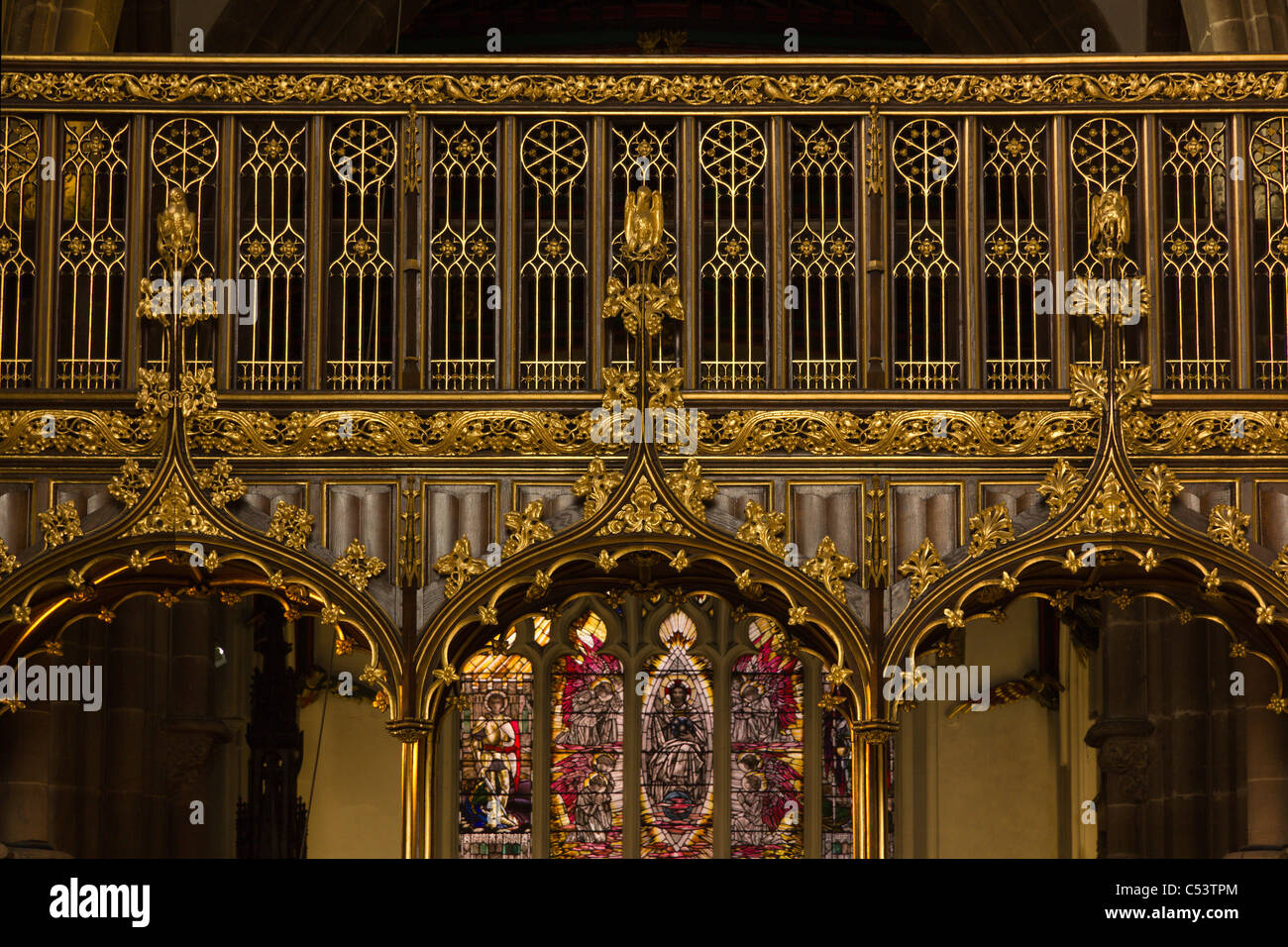 Ornate carved and gold gilded wooden chancel screen, Leicester Cathedral, Leicester, England, UK Stock Photo