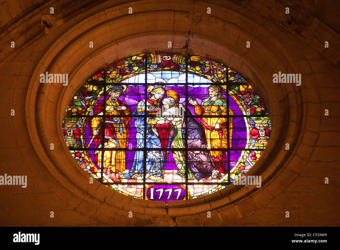 A stained glass window in Seville Cathedral the largest Cathedral in