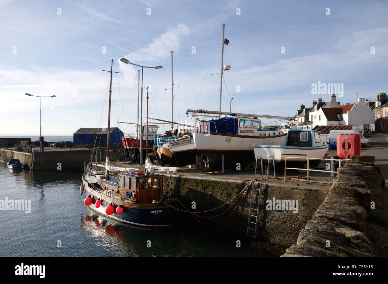 Boats in and around St Monans harbour Stock Photo