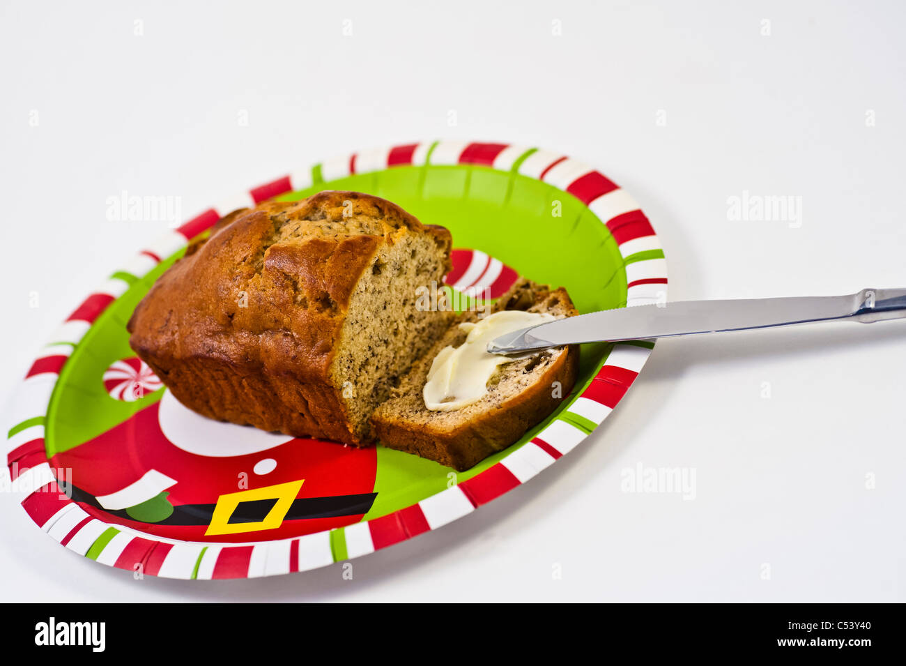 Loaf of Christmas banana bread cut and ready to eat. Stock Photo