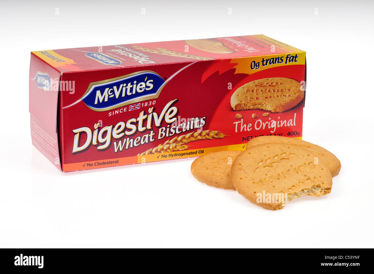 A box of McVitie's digestive wheat biscuits with a few biscuits outside of box one with bite out of it on white background. Stock Photo