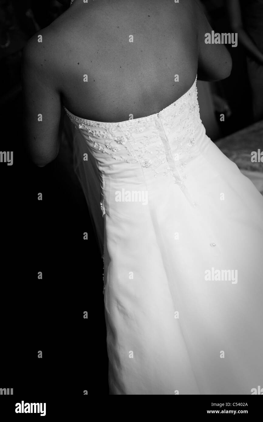 Bride Getting Dressed Before Wedding Bare Back And Wedding Dress