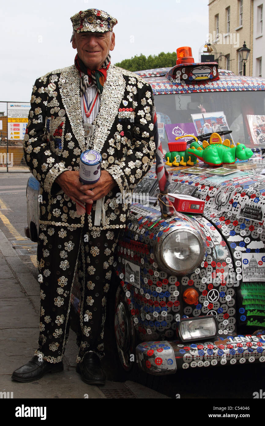 Pearly King and London taxi Stock Photo