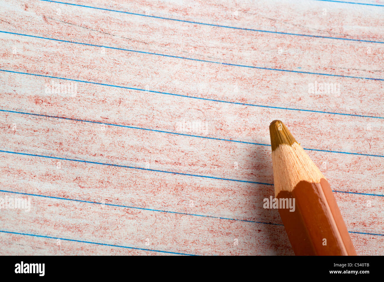 Brown color pencil with coloring on a piece of paper Stock Photo