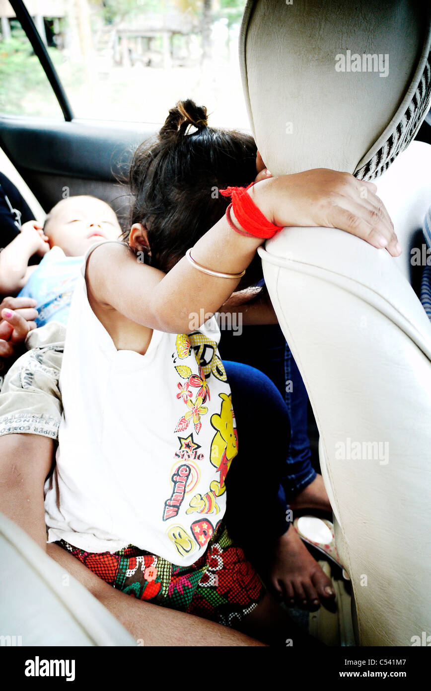 in the car with Cambodian children Stock Photo