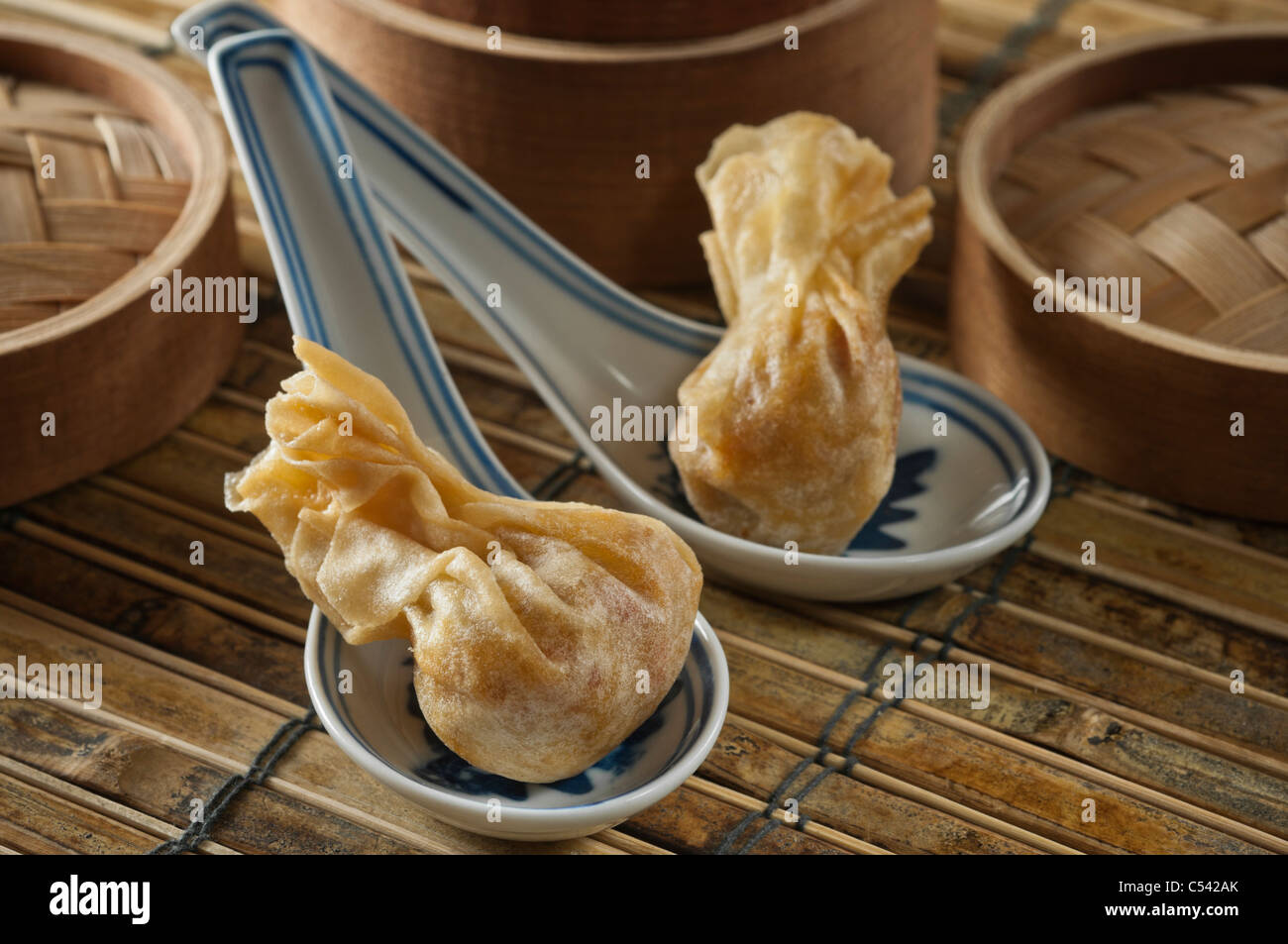 Won ton in Chinese spoons Stock Photo