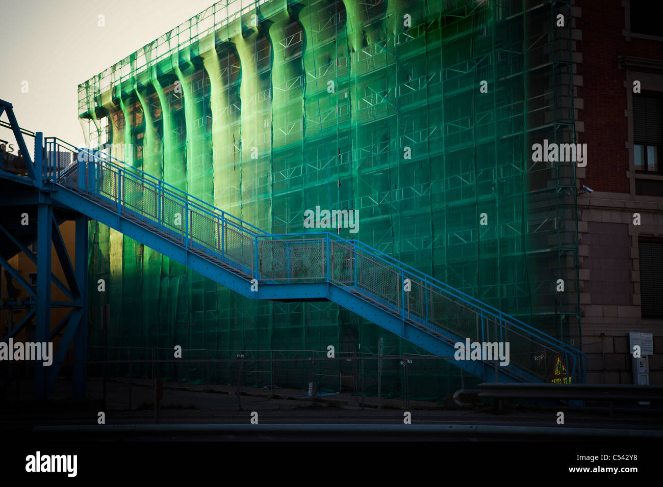 Scaffolding with blue stairway Stock Photo - Alamy