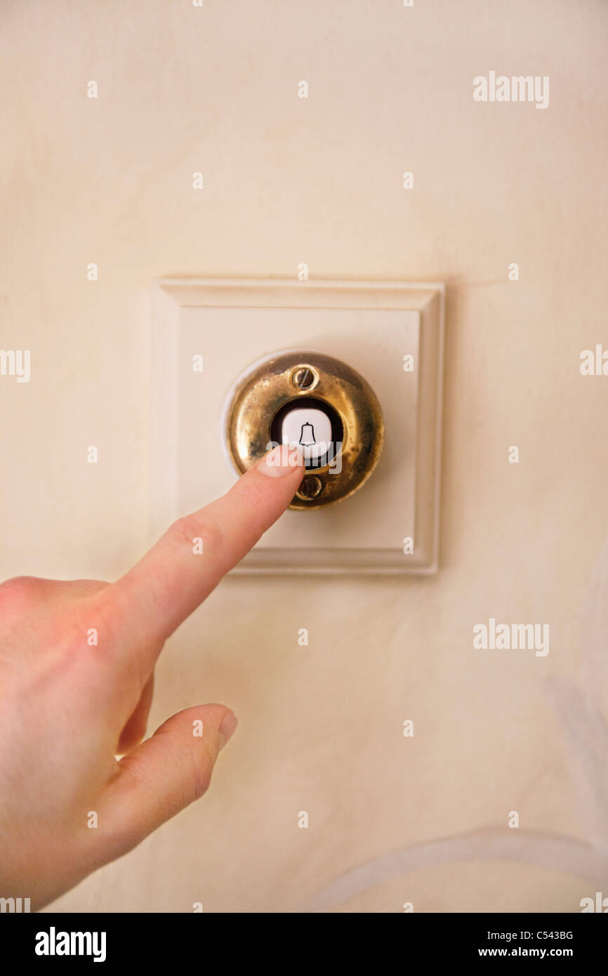 Close up hand doorbell hires stock photography and images Alamy
