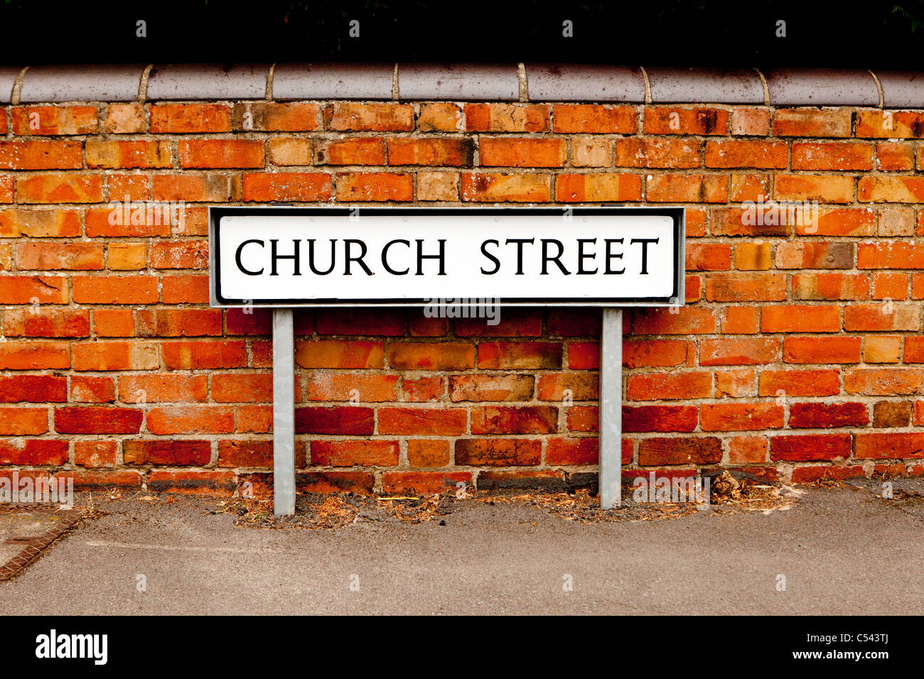 UK traditional freestanding street road sign, 'Church Street' Black on white. Stock Photo