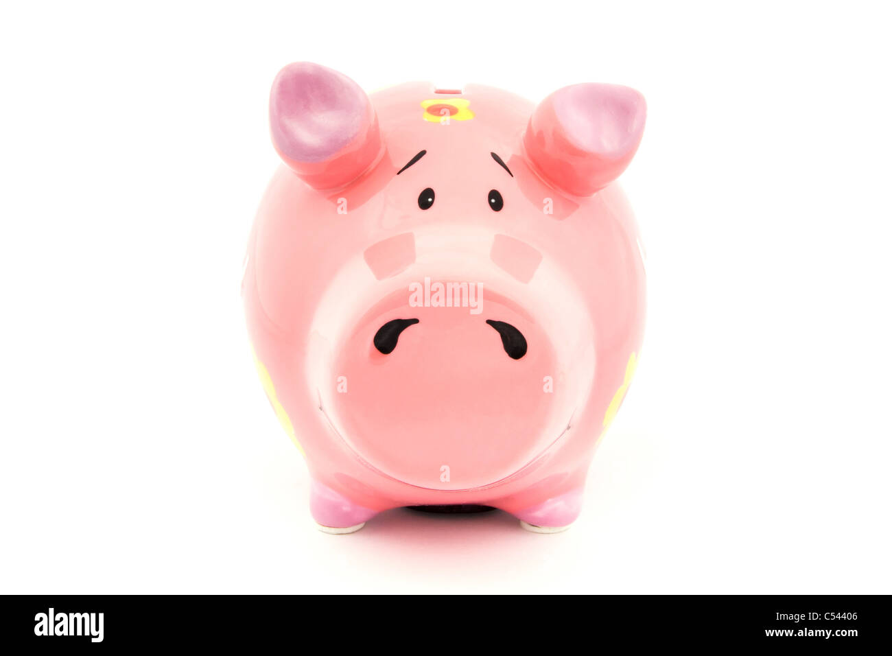 Pink Piggy bank with yellow flowers on white Stock Photo