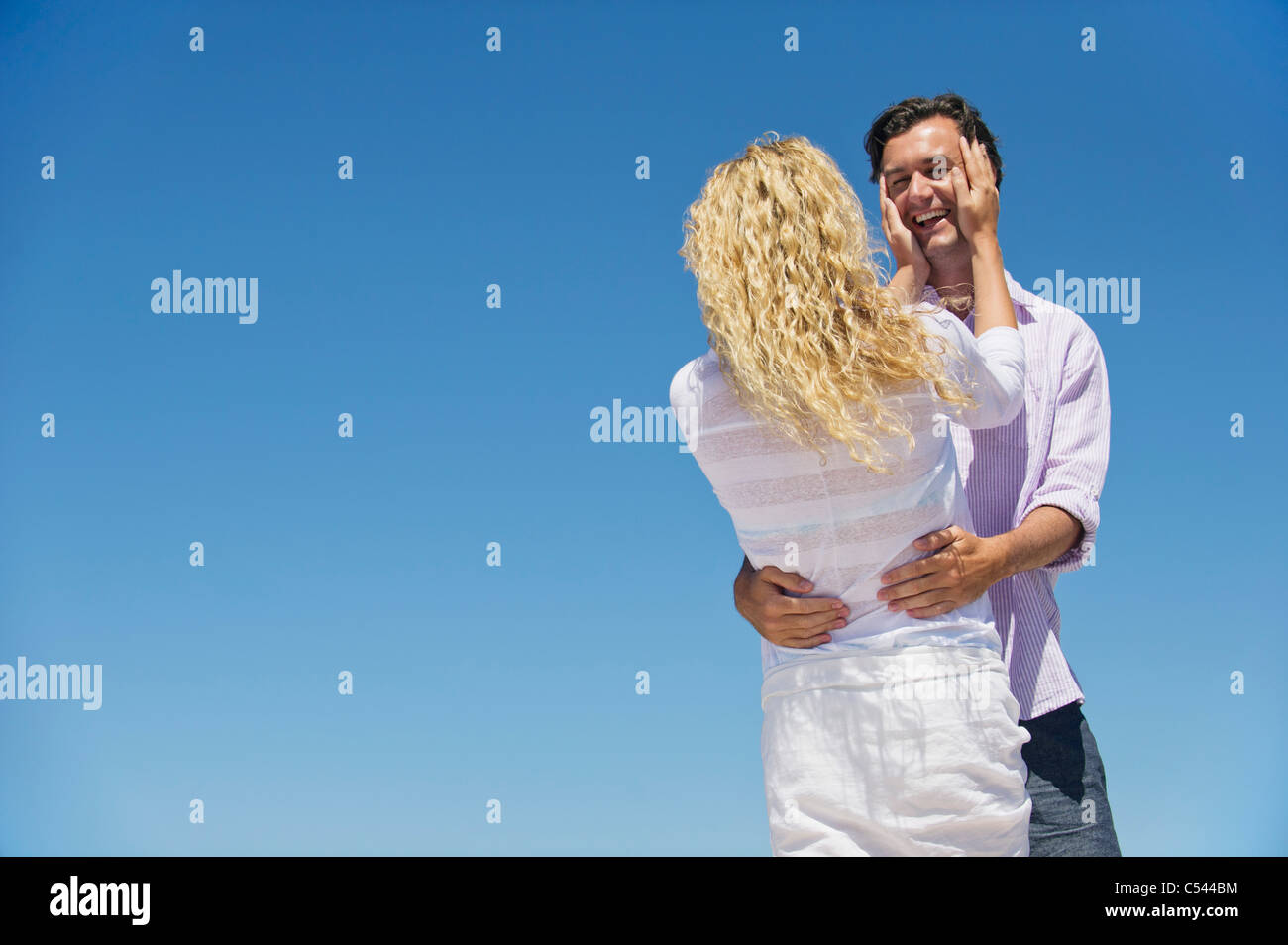 Couple embracing each other Stock Photo