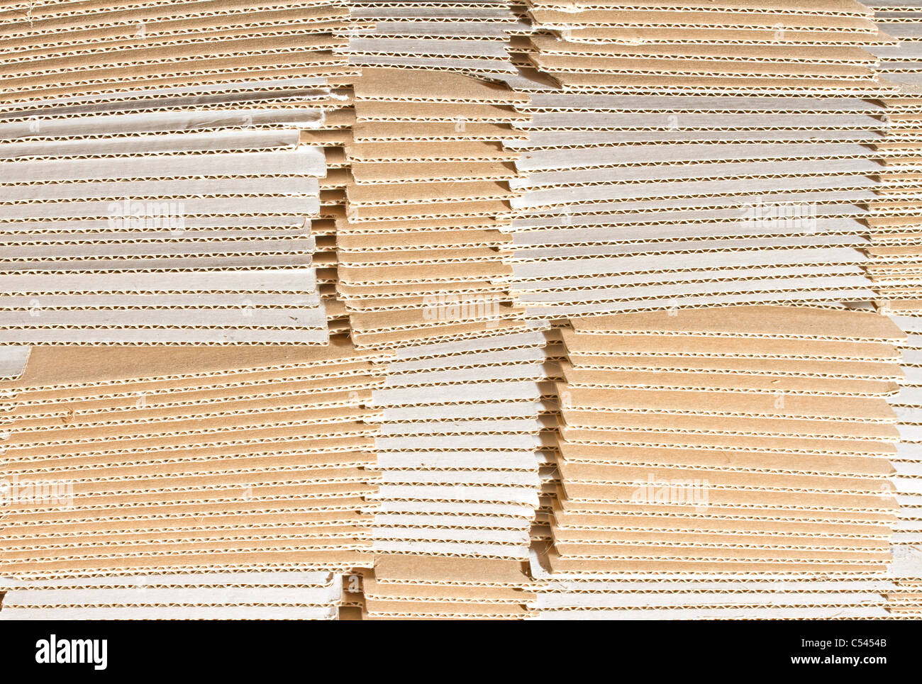 Stack of unmade cardboard cartons Stock Photo Alamy