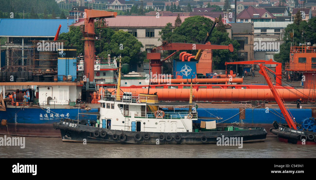 Container ship at a commercial dock, Yangtze River, Shanghai, China ...