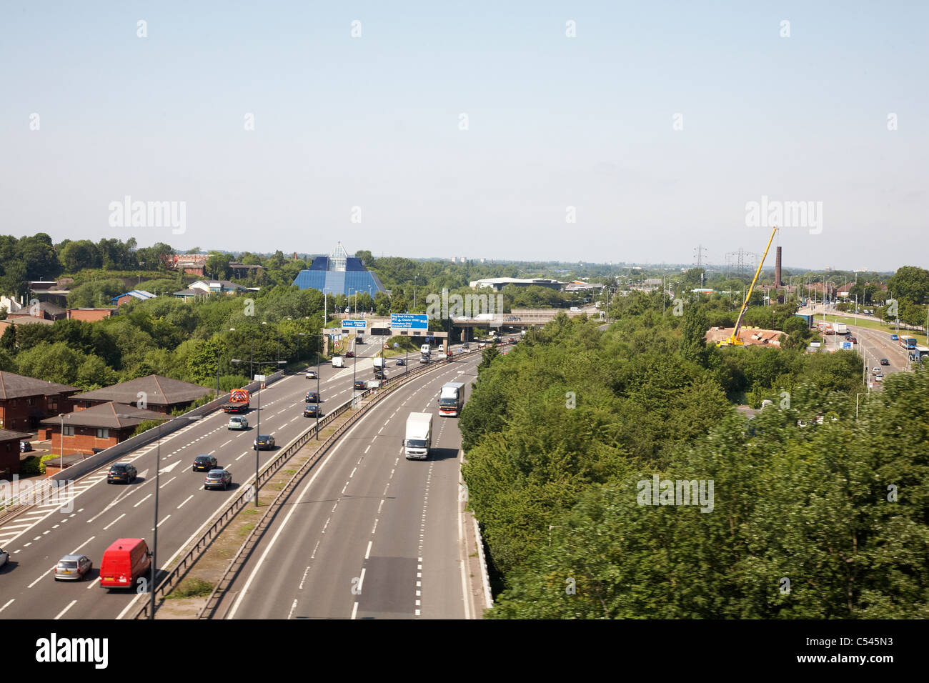 The M60 motorway with Pyramid building as seen from Stockport viaduct Stock Photo