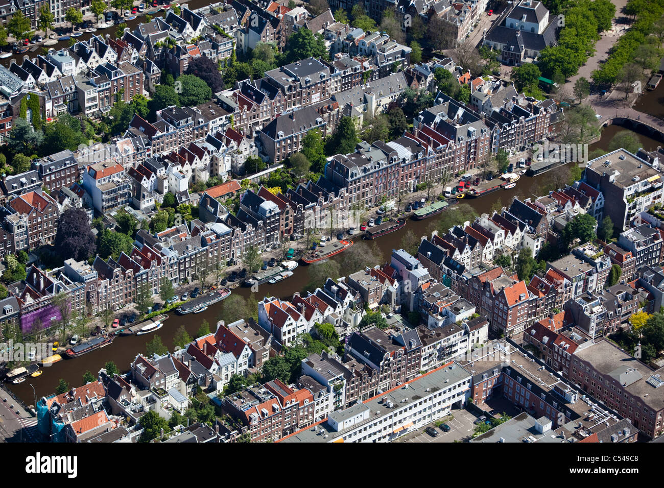 The Netherlands, Amsterdam, Aerial of city centre with 17th century houses and canals. Unesco World Heritage Site. Stock Photo