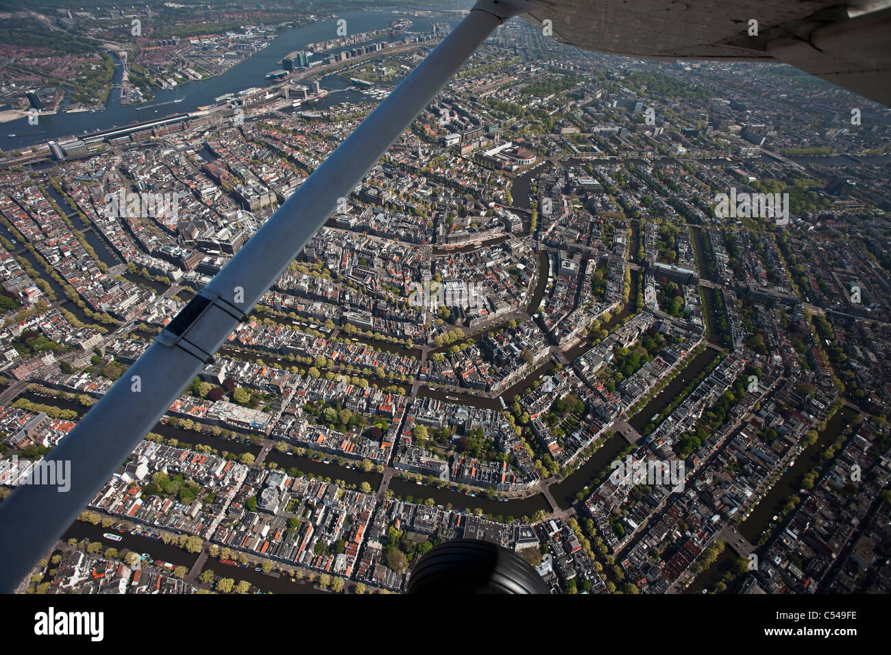 The Netherlands, Amsterdam, Aerial of canals and city centre. Unesco World Heritage Site. Stock Photo