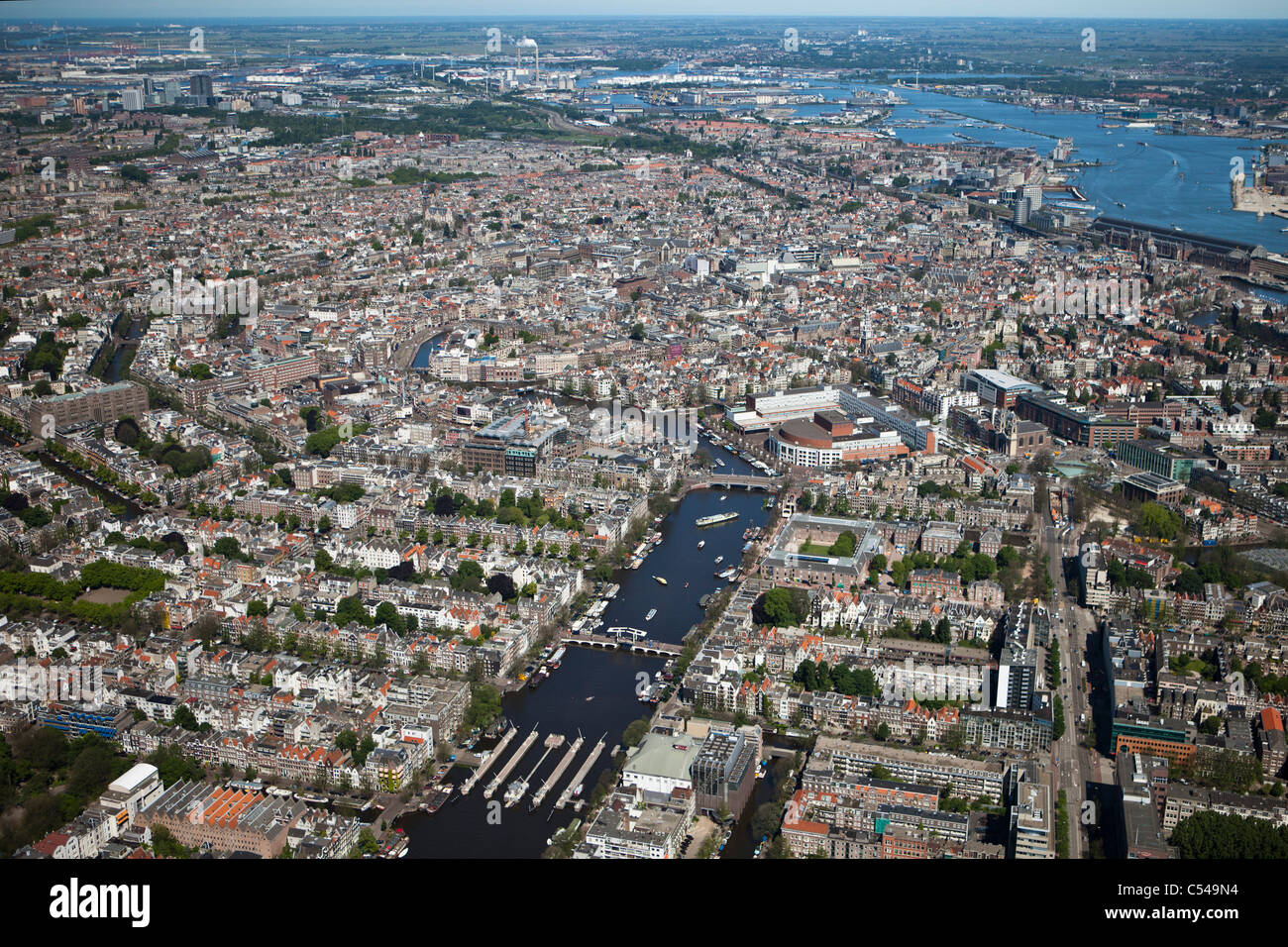 The Netherlands, Amsterdam, Aerial of city centre and Amstel river. Unesco World Heritage Site. Stock Photo