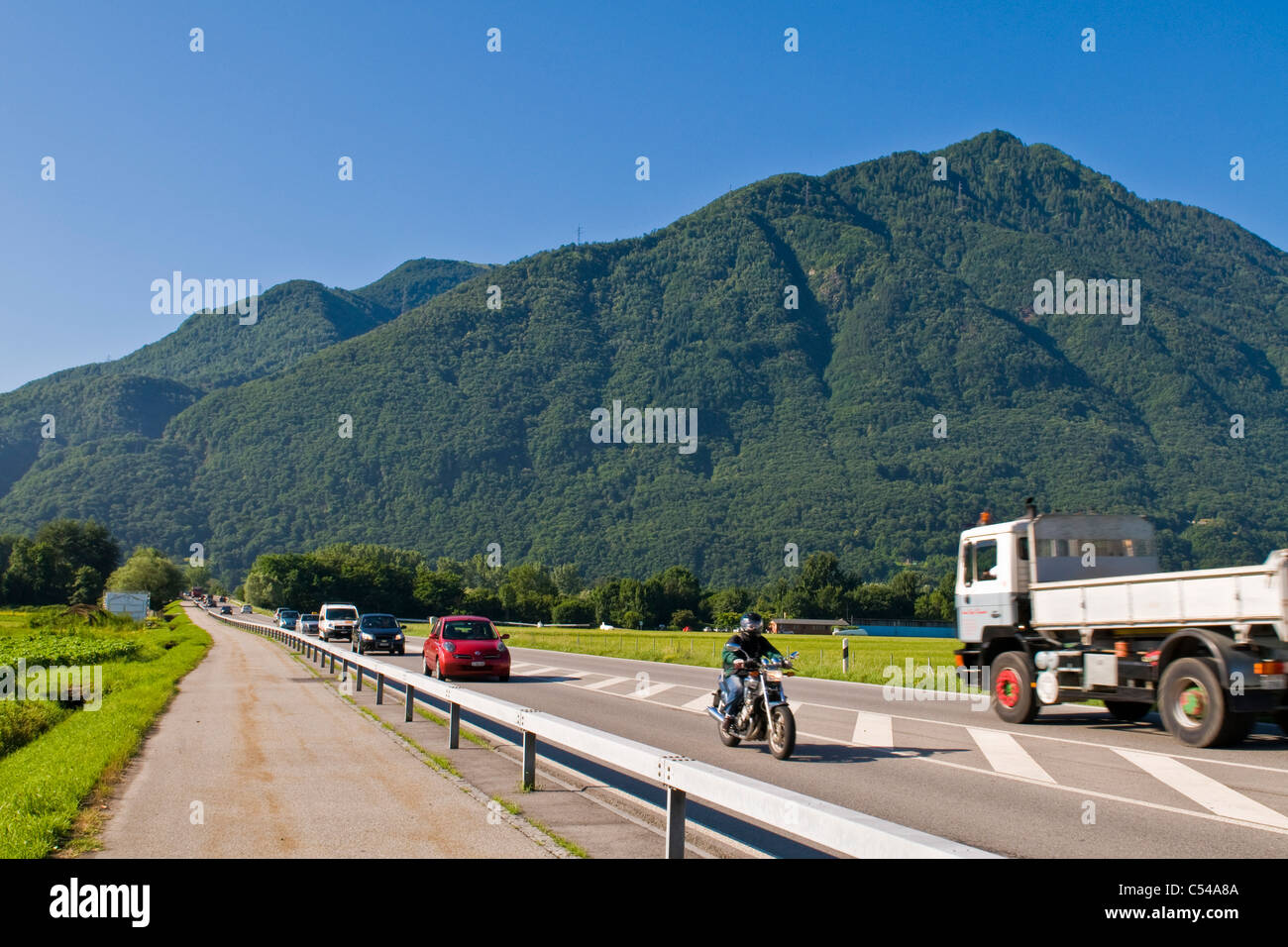 Bicycle Path Piano Di Magadino Canton Ticino Switzerland Stock Photo bicycle-path-piano-di-magadino-canton-ticino-switzerland-stock-photo
