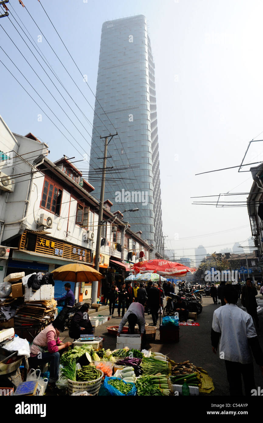 Shanghai market stalls with new buildings in the background Stock Photo