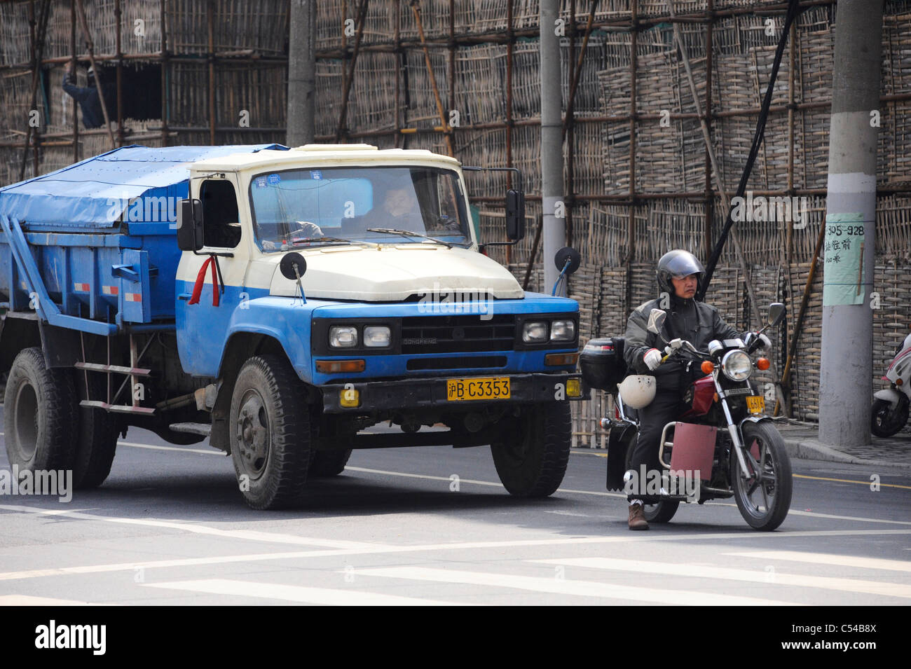 A truck and a motorcycle in Shanghai Stock Photo