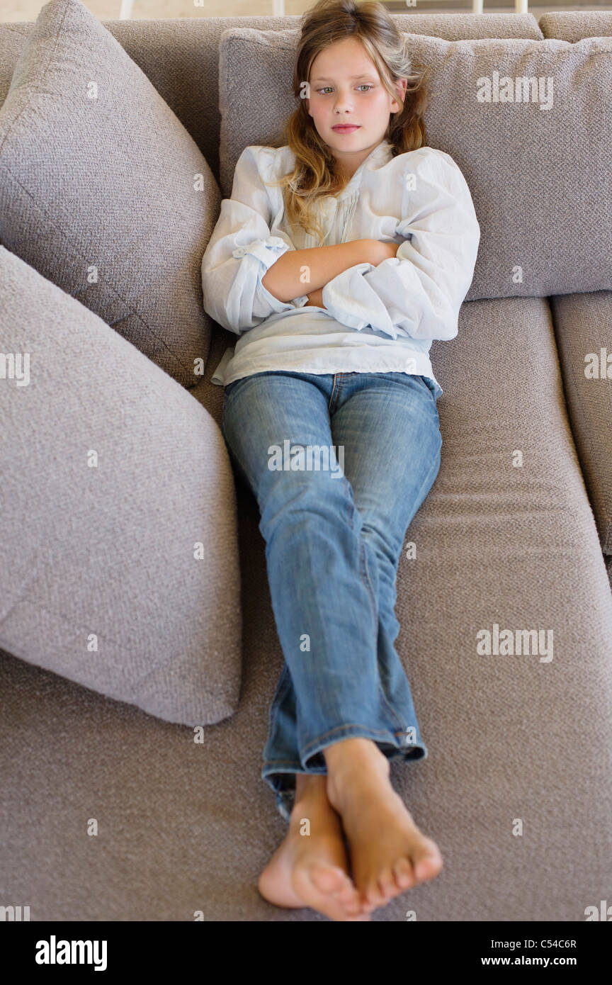 High Angle View Of A Girl Lying On A Couch Stock Image High Angle View Of A Girl Lying On A Couch Stock Image