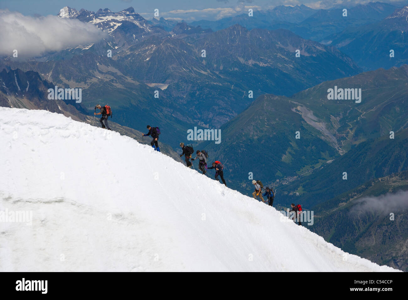 Mountaineers ascend from the Vallee Blanche to the Aiguille du Midi, Chamonix, France, Mont Blanc Massif, Alps Stock Photo