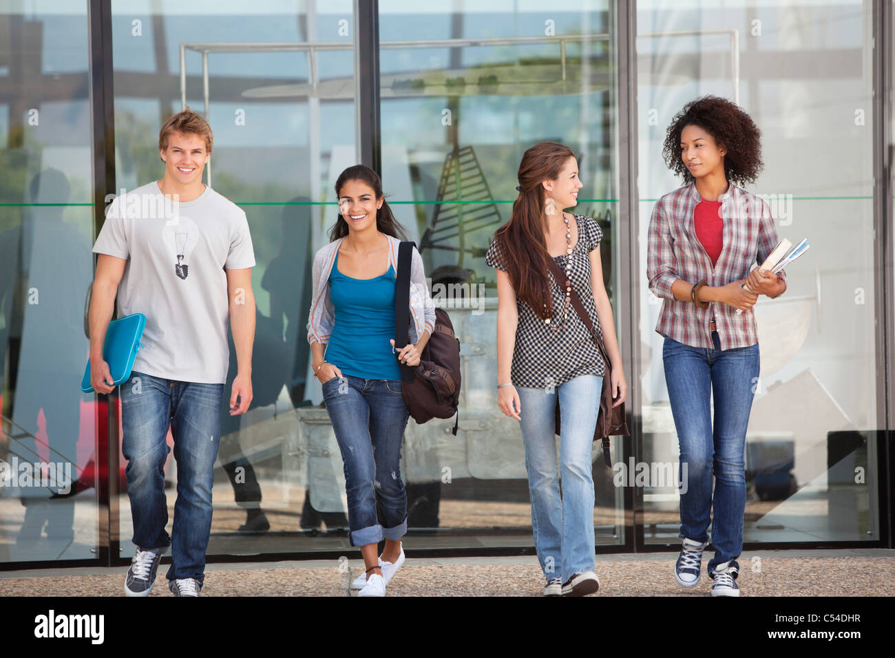 University students walking in a campus Stock Photo - Alamy