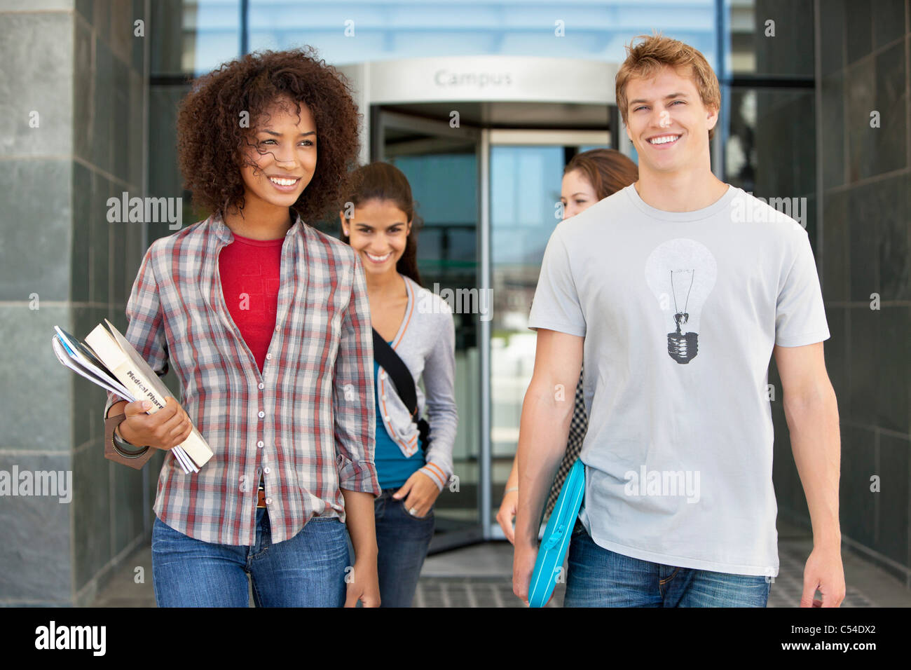 Cheerful friends in campus Stock Photo