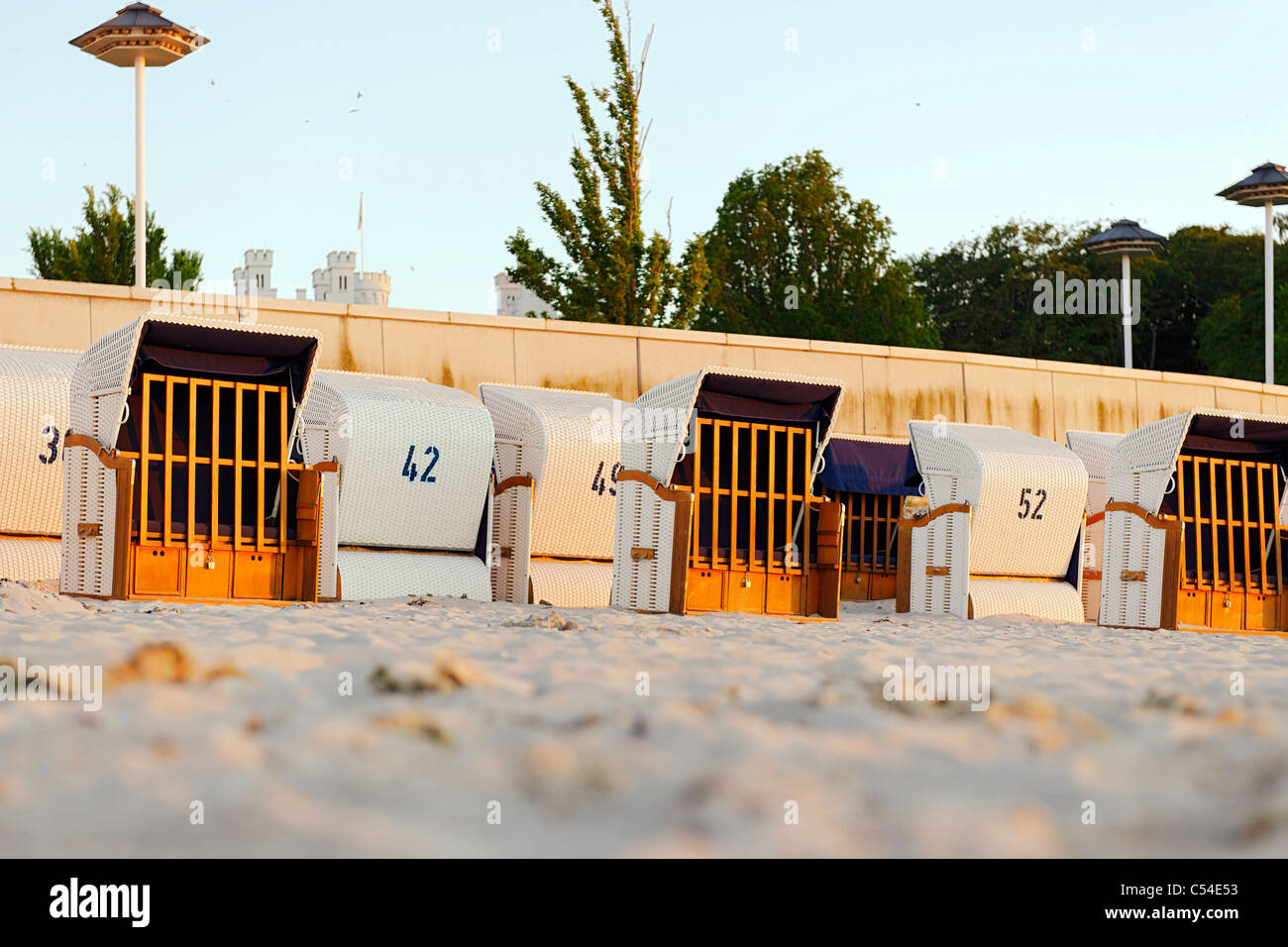 Roofed wicker beach chairs, beach, Baltic Sea, sunset, seaside resort