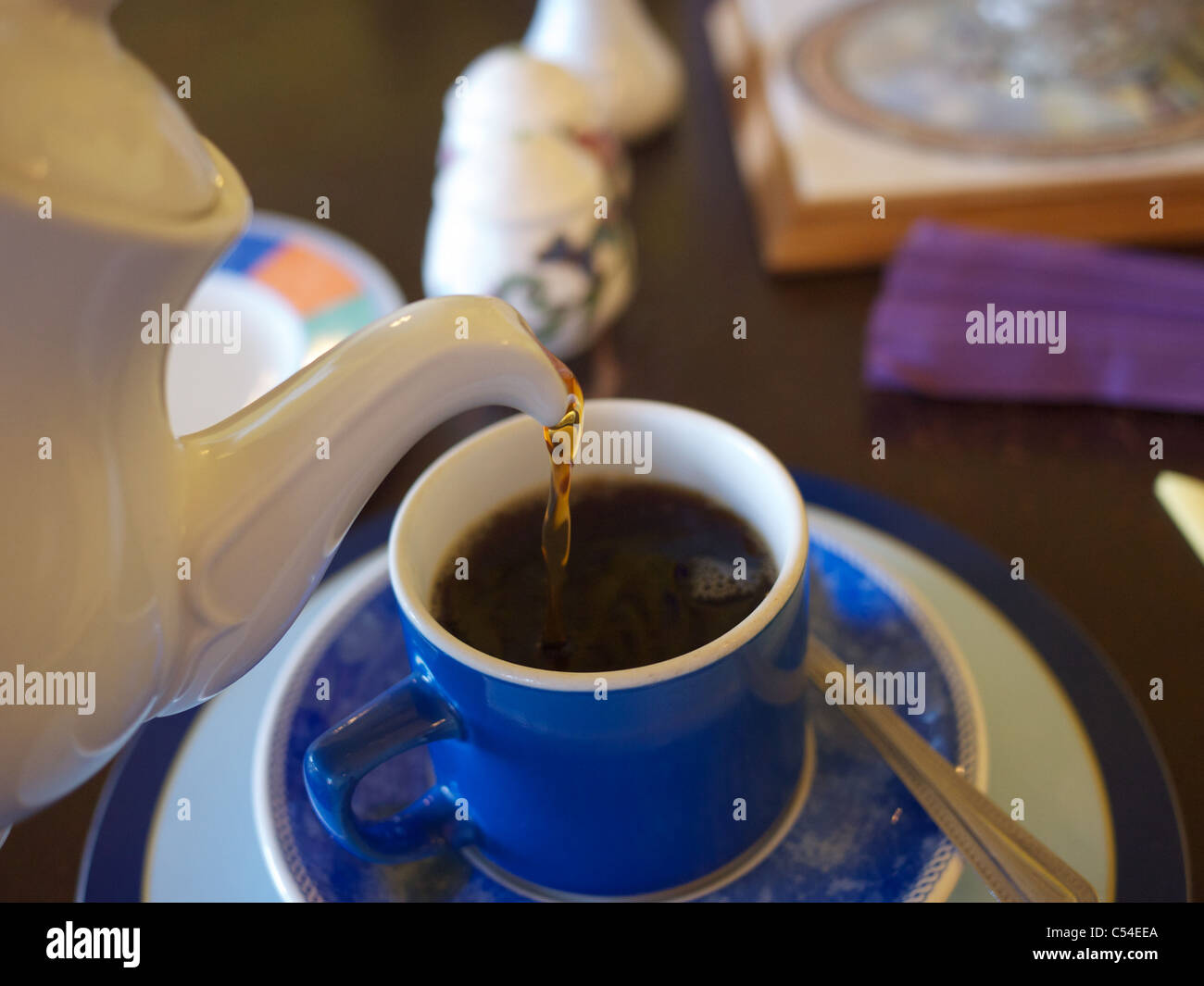 pouring Coffee at Rodgers Tea Rooms, Exeter, Devon Stock Photo