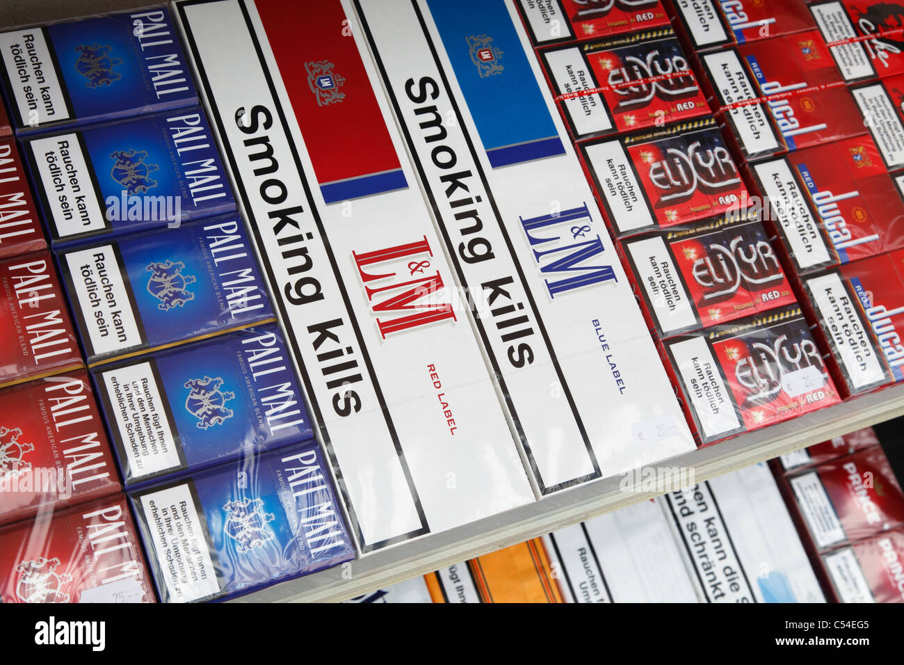 warning 'smoking kills' on cigarette packs in a duty free shop on Island Helgoland Stock Photo