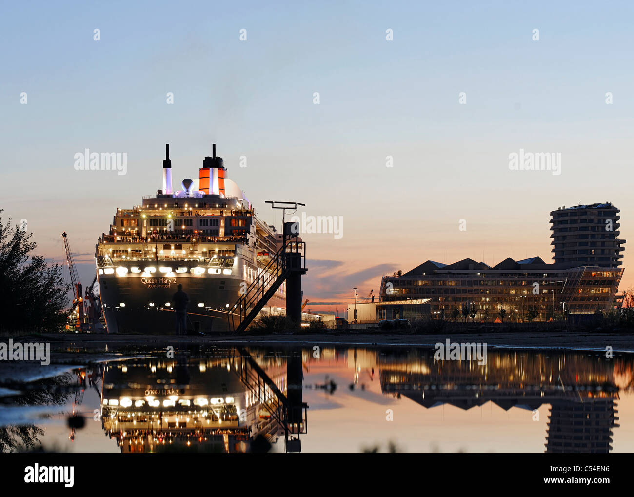 Luxury ocean liner Queen Mary II at dusk, Grasbrook, Hafencity, Hamburg-Mitte district, Hamburg Germany, Europe Stock Photo