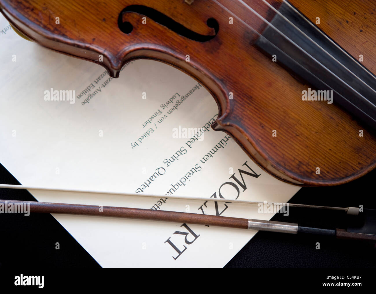A violin, bow and music Stock Photo