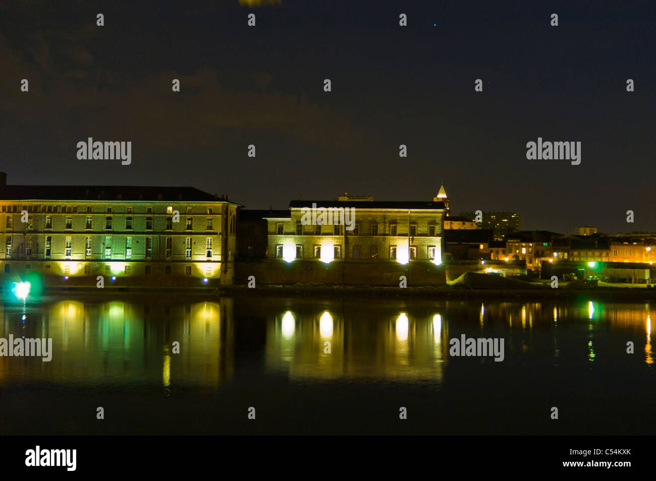 Toulouse, France, Cityscape, Panorama of City Center from Garonne River at Night Stock Photo