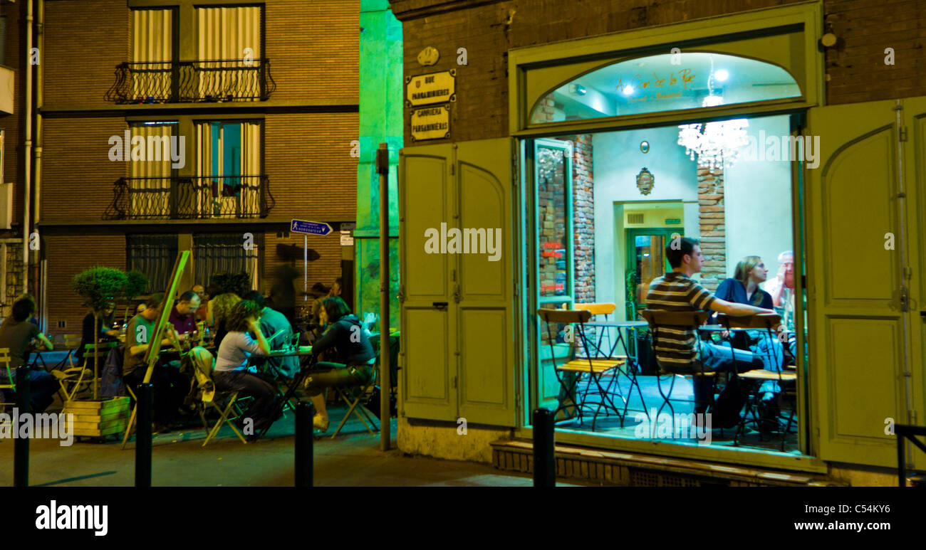 Toulouse, France, People Sharing Meals Outside French Bistro Restaurant, Night Stock Photo