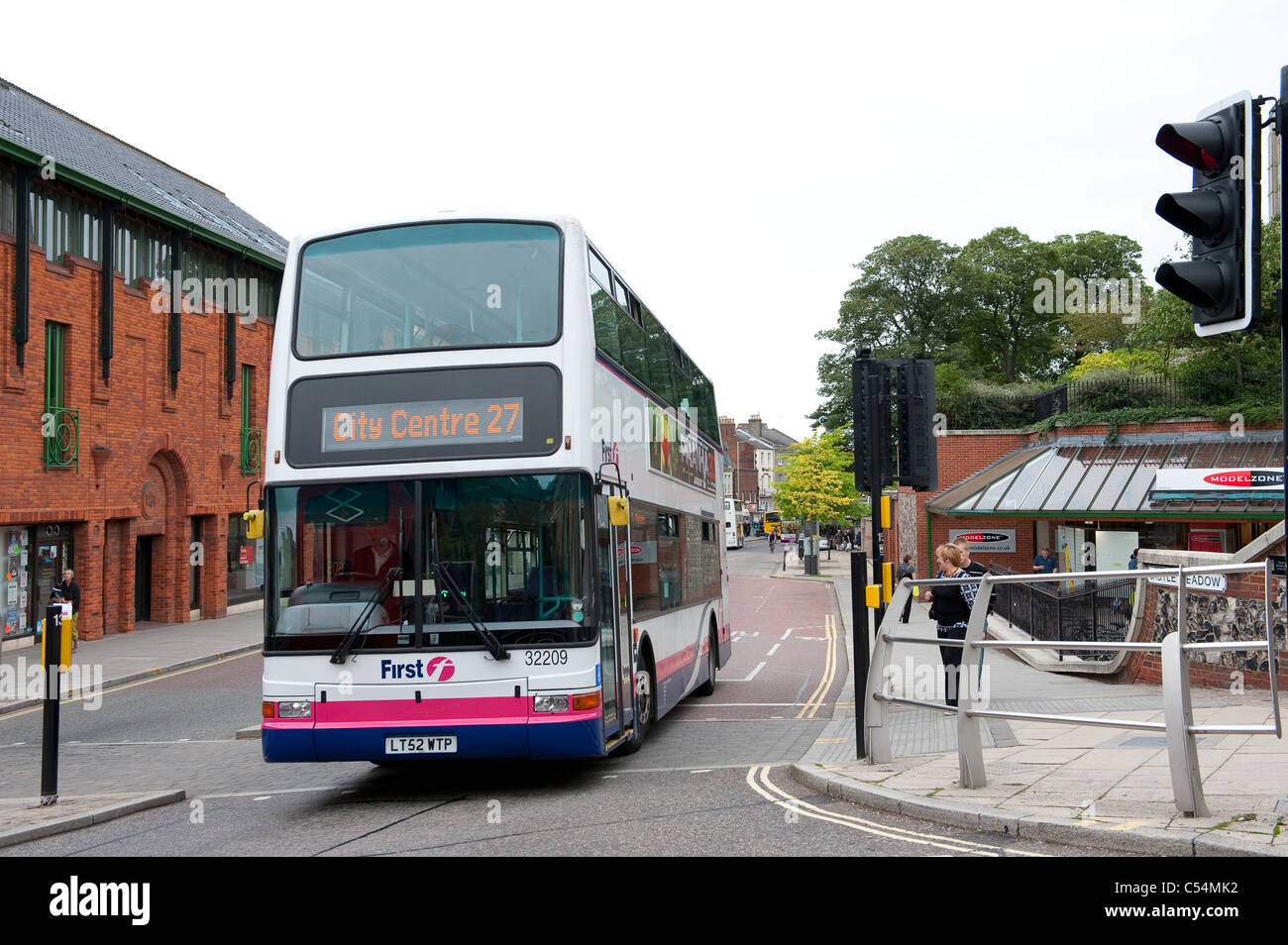 Double decker bus in Firstbus livery driving through Norwich city centre, Norfolk, England. Stock Photo