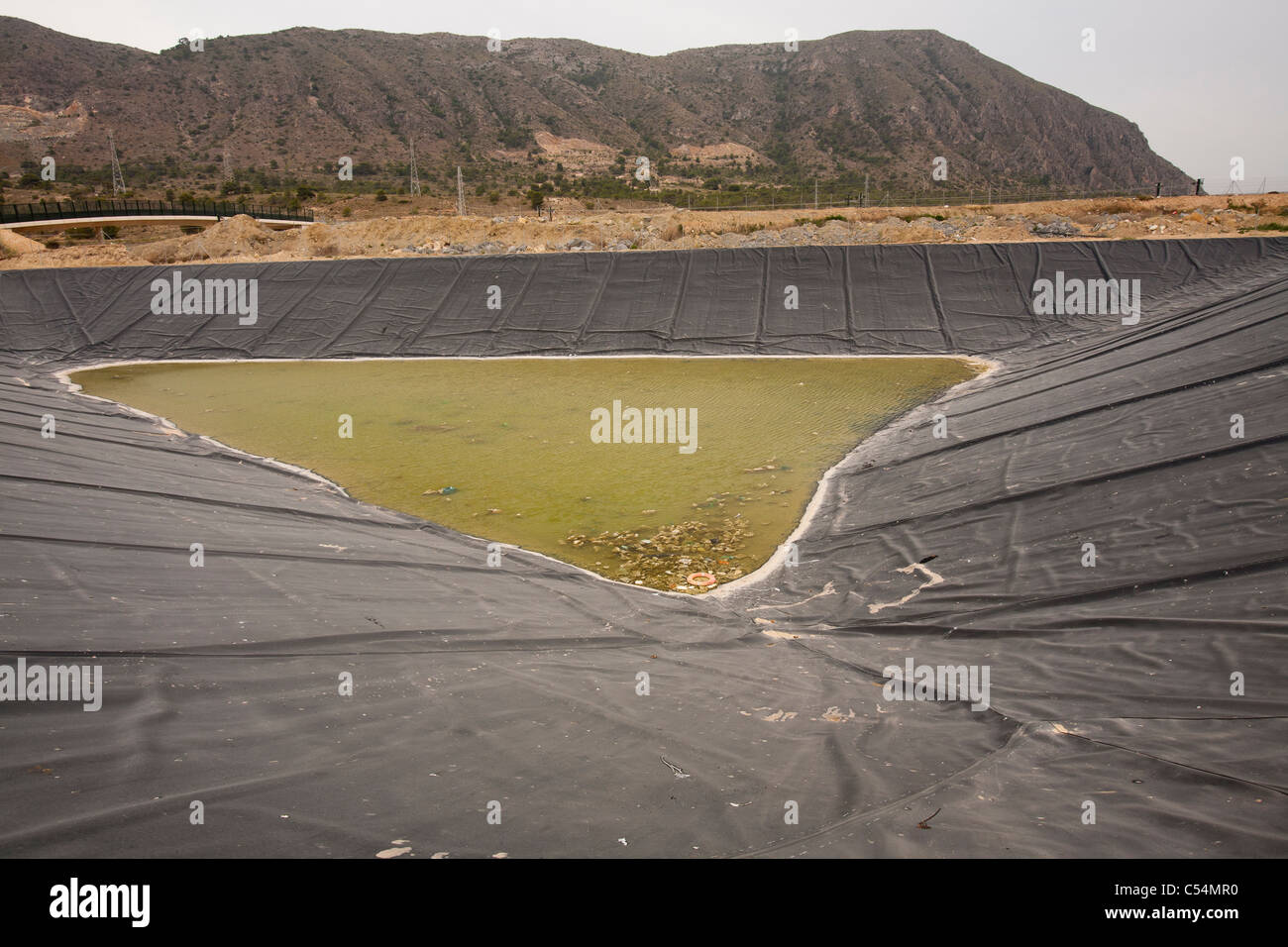A capture pond on a landfill site in Alicante, Murcia, Spain. Stock Photo