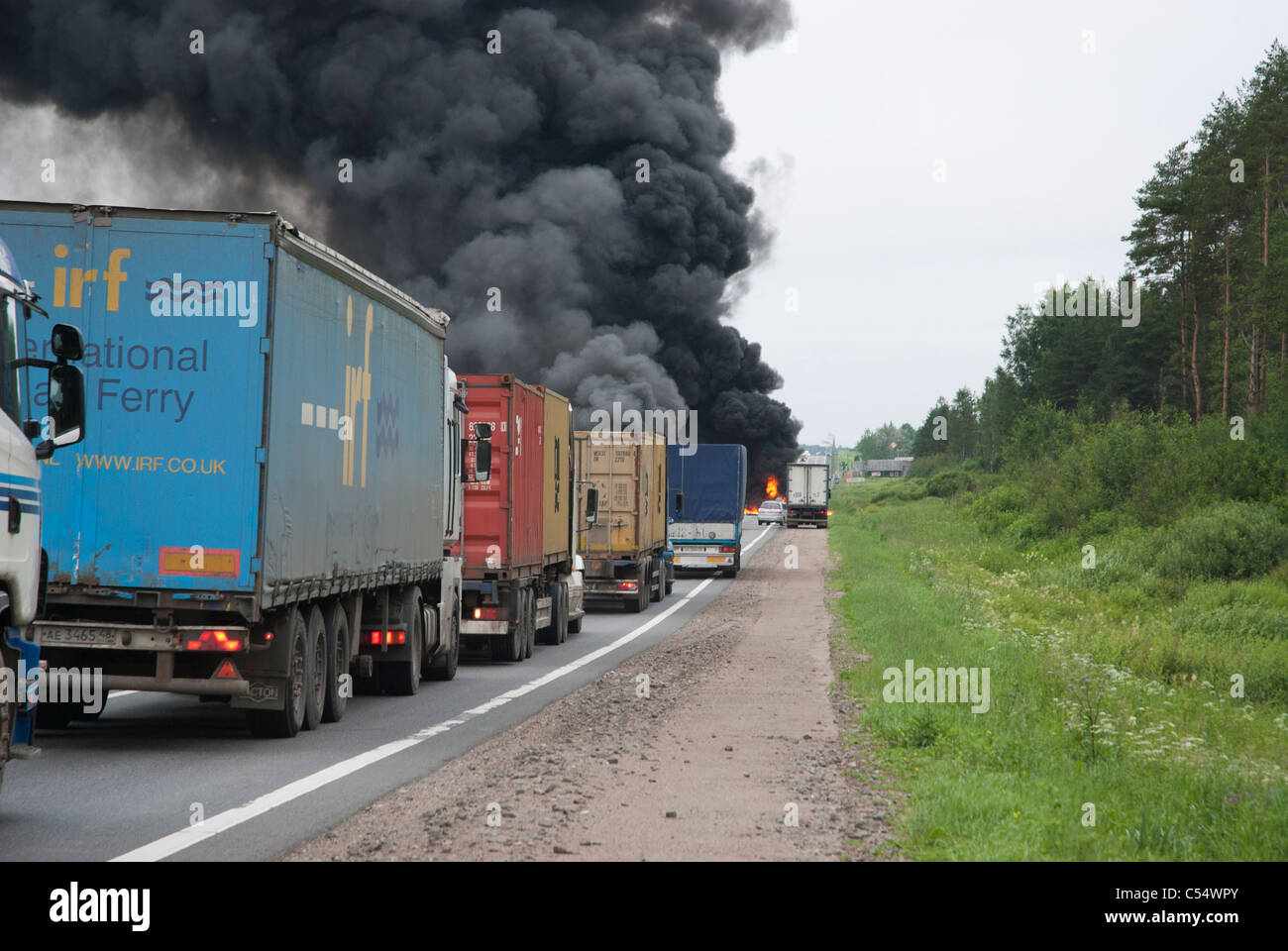 Blocked traffic of the road from Moscow to Saint-Petersburg due to the lorry's collision Stock Photo