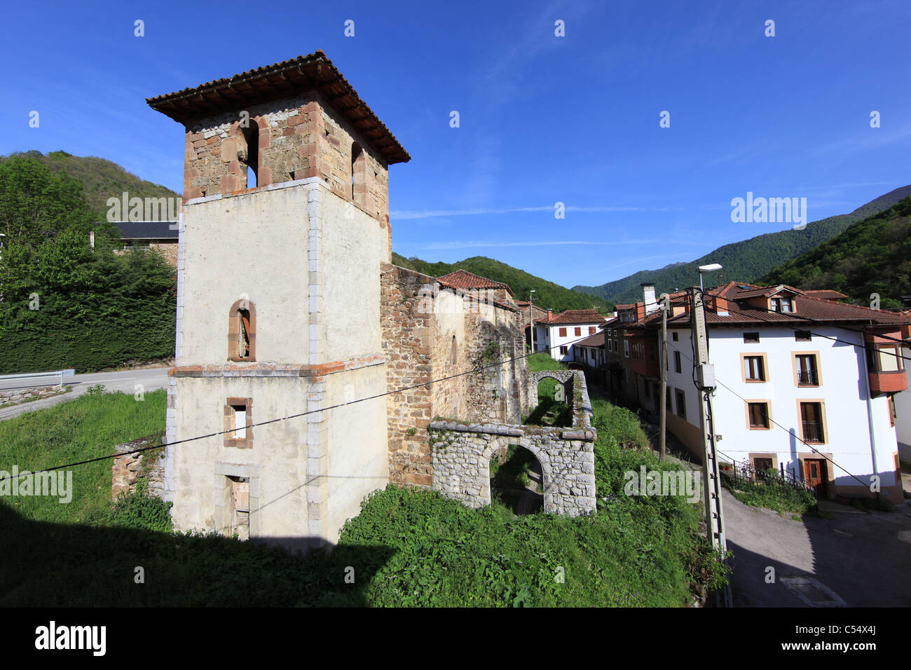 Semi-derelict church with tower in Espinama, Cantabria, Spain Stock Photo