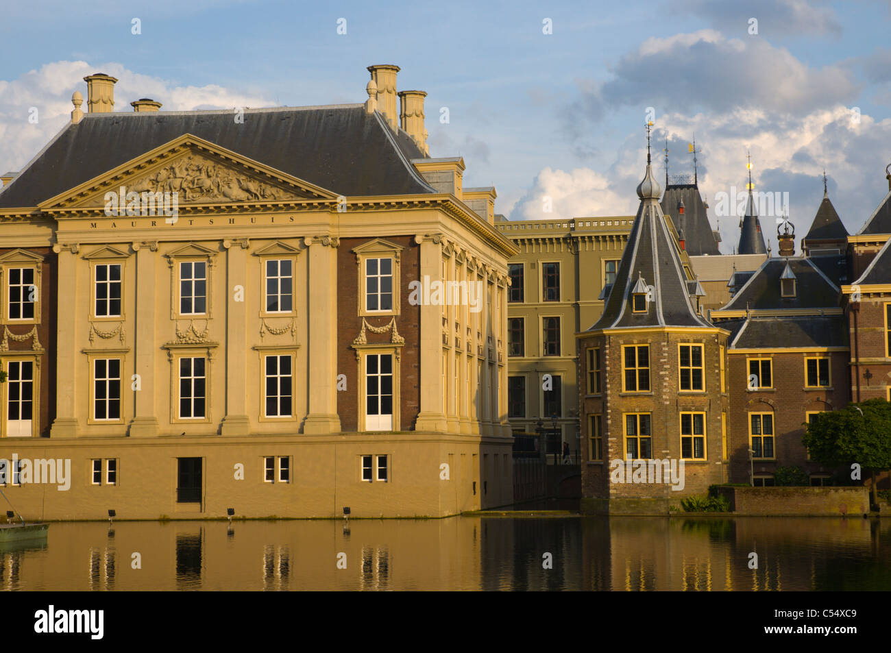 Mauritshuis on left and Binnenhof palace complex by Hofvijver lake Den Haag the Hague the Netherlands Europe Stock Photo