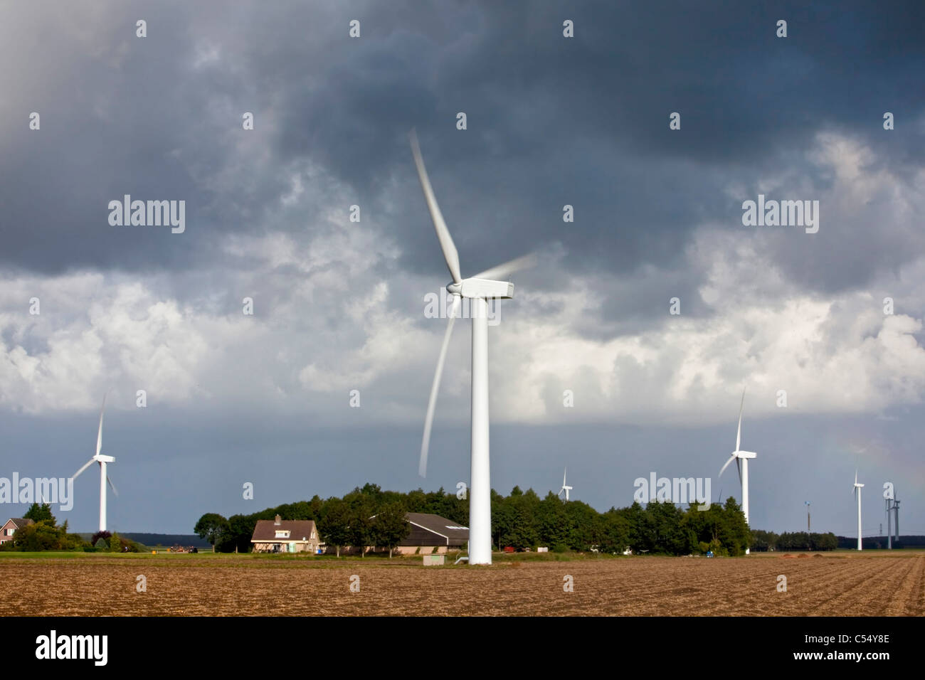 The Netherlands, Almere, Wind turbines, windmills and farm Stock Photo