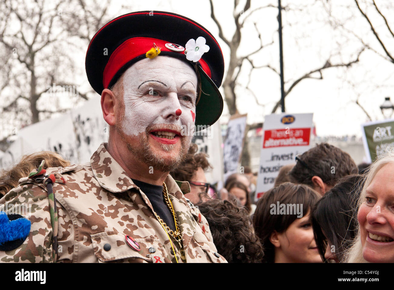 Clown make up man participating in a demonstration. Stock Photo