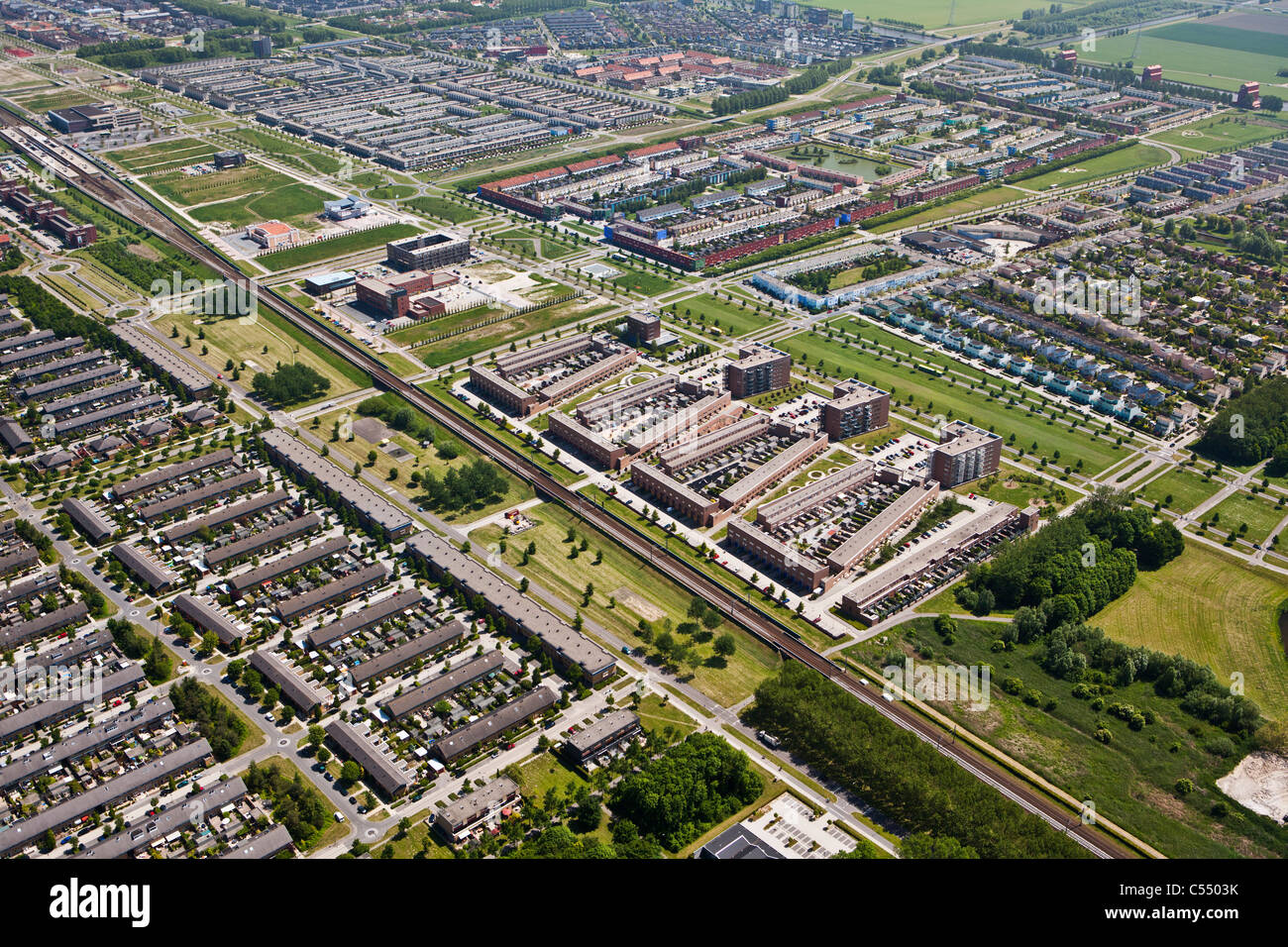 The Netherlands, Almere, Modern residential areas. Aerial Stock Photo