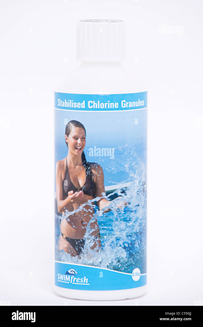 A bottle of Swimfresh Stabilised Chlorine Granules for treating a swimming pool on a white background Stock Photo