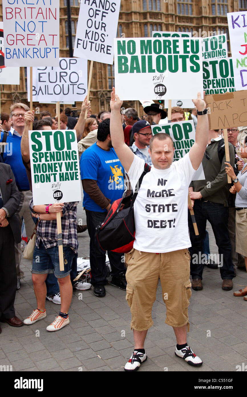 Around 250 people take part in a Rally Against Debt to call for greater public spending cuts to eliminate the UK Government debt Stock Photo